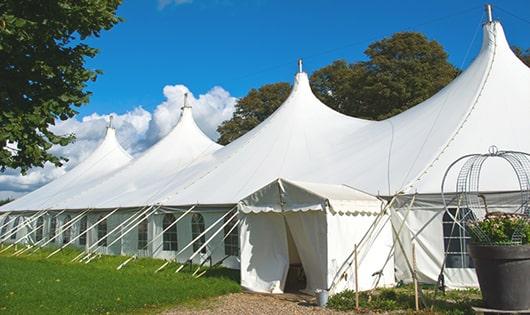 high-quality portable restrooms stationed at a wedding, meeting the needs of guests throughout the outdoor reception in Clay, MI